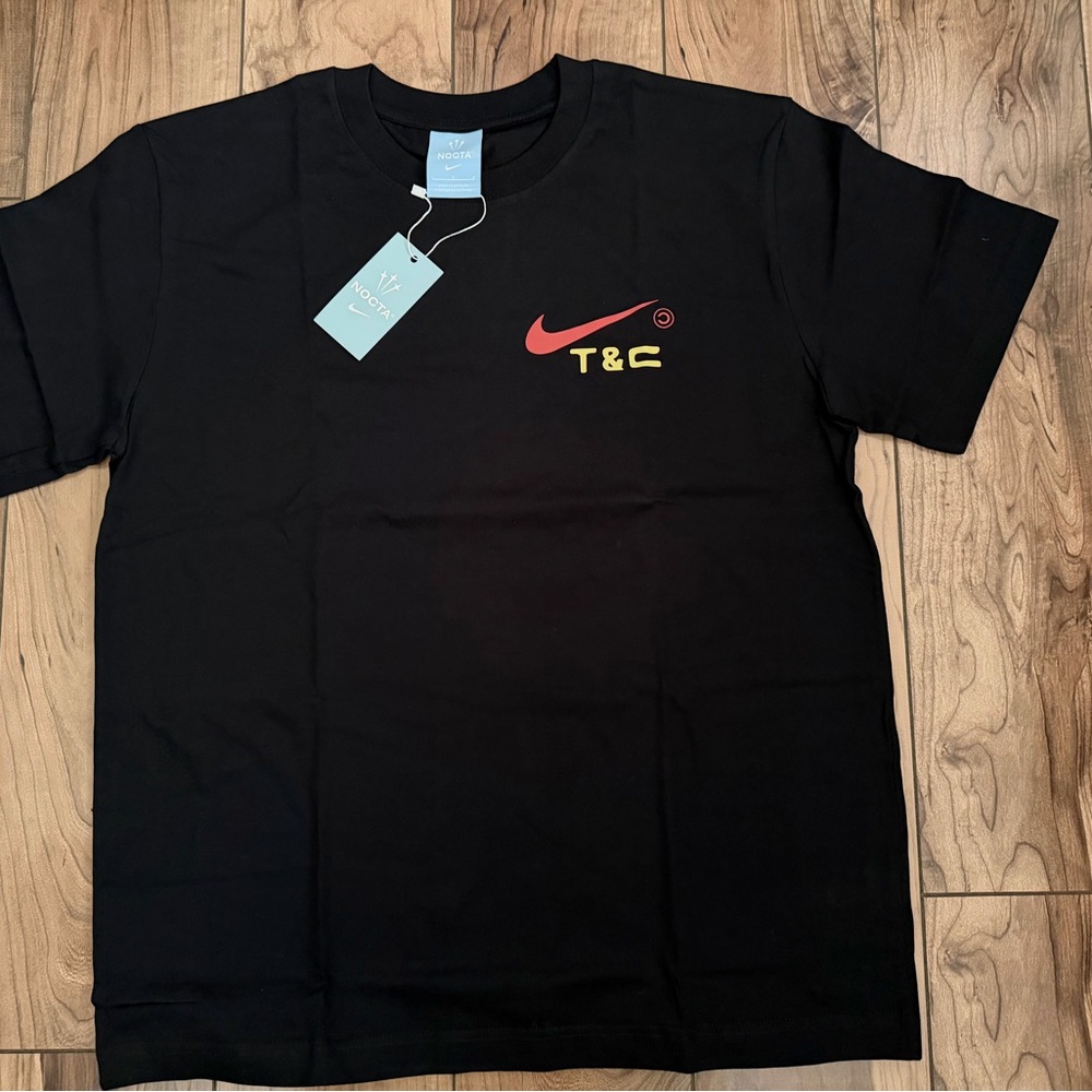Nike Black Short Sleeve Tee with Red and Yellow Logo
